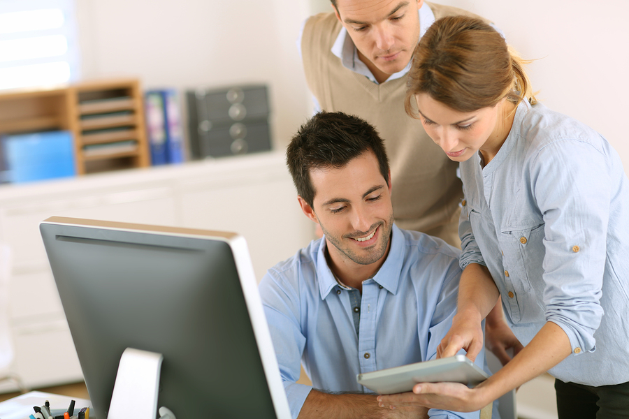 office workers using tablet